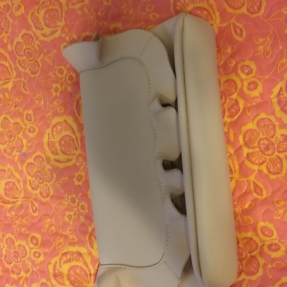 Pink faux leather clutch